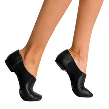 Load image into Gallery viewer, Female model wearing CAPEZIO Hanami Wonder Jazz Shoe, Style: CG30C, Color: Black, View: Side.