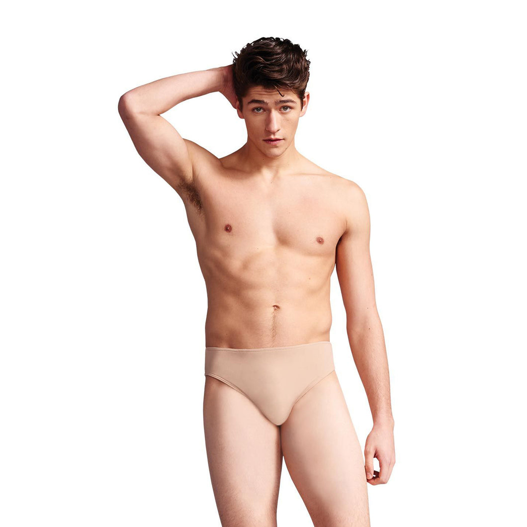 Male model wearing Capezio Full Seat Dance Brief, Style: 5935 formerly Style: 5939, color nude.