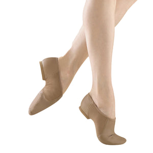 Female model wearing BLOCH Neo Flex Slip On Leather Jazz Shoe. Style: S0495L. Color: Tan. View: Side.